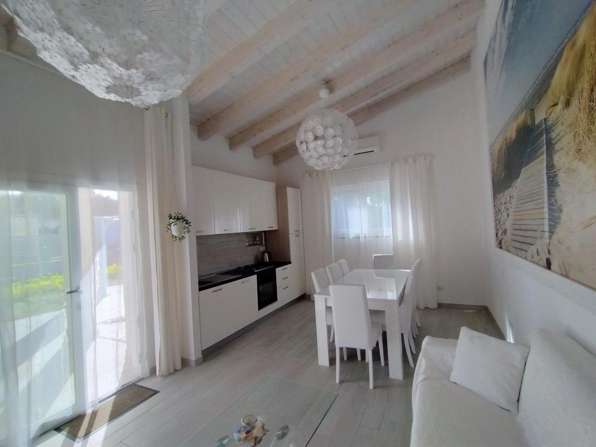 Ikebana Villas Porto Pino Beach Kültér fotó