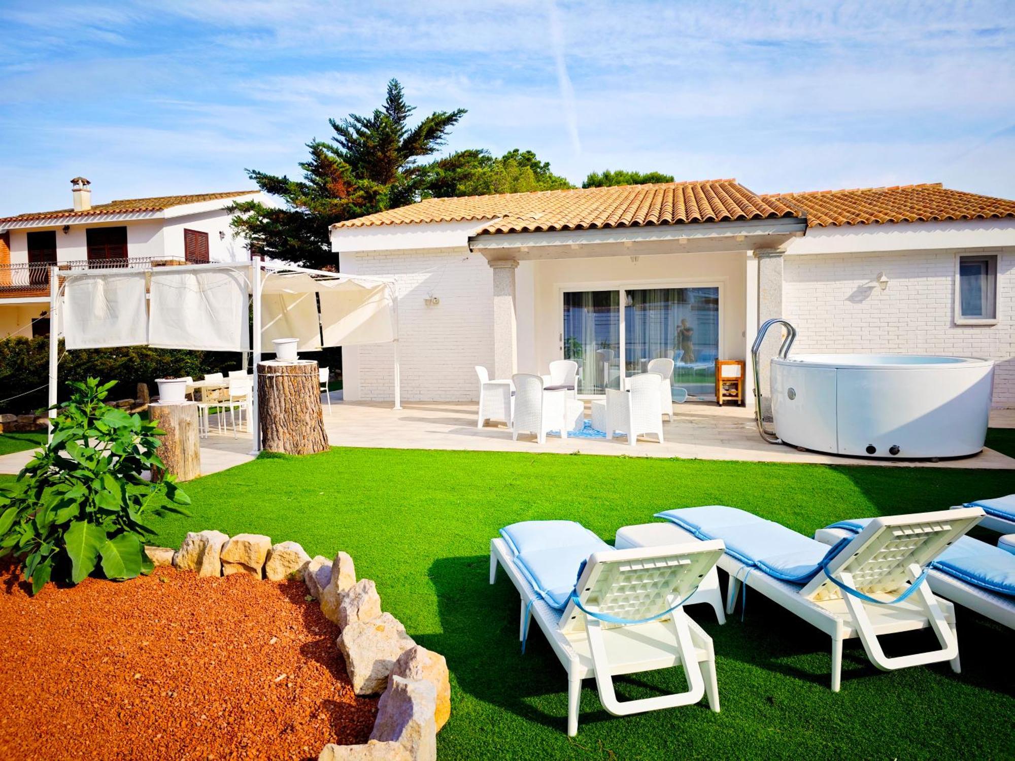 Ikebana Villas Porto Pino Beach Kültér fotó